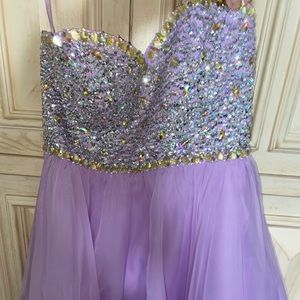 Strapless purple bedazzled dress.